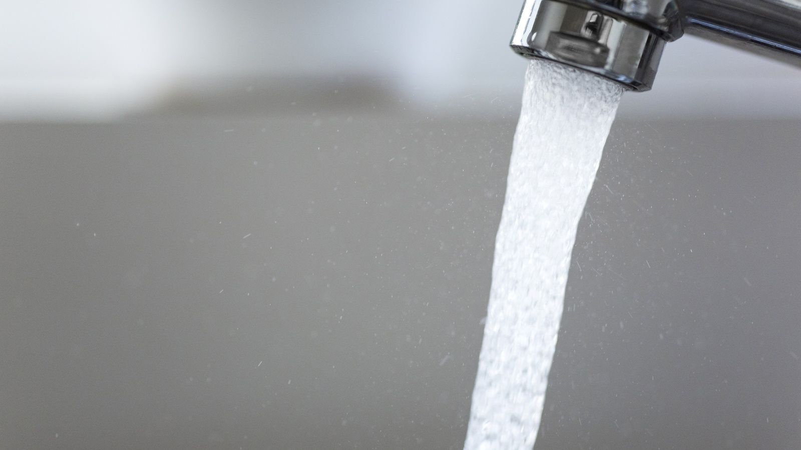 Water running from a chrome tap